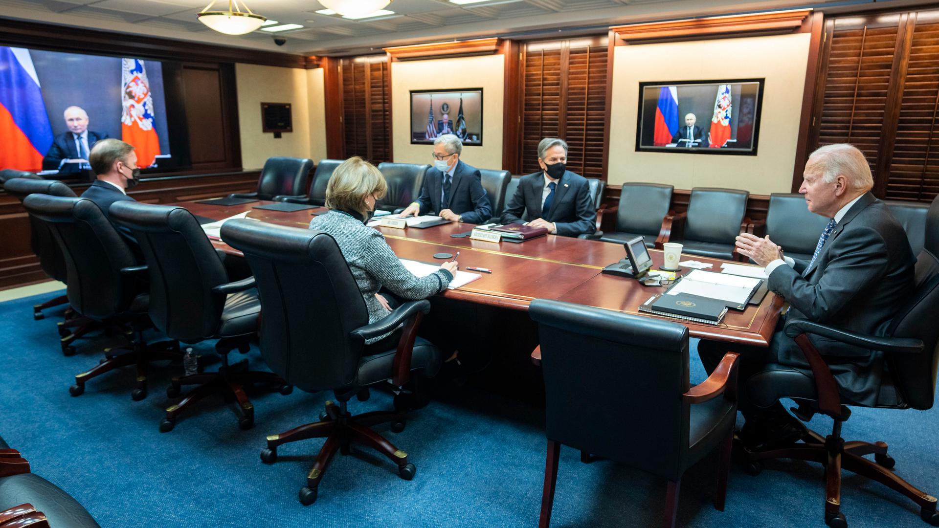 Presidents Joe Biden and Vladimir Putin during a video meeting on Tuesday