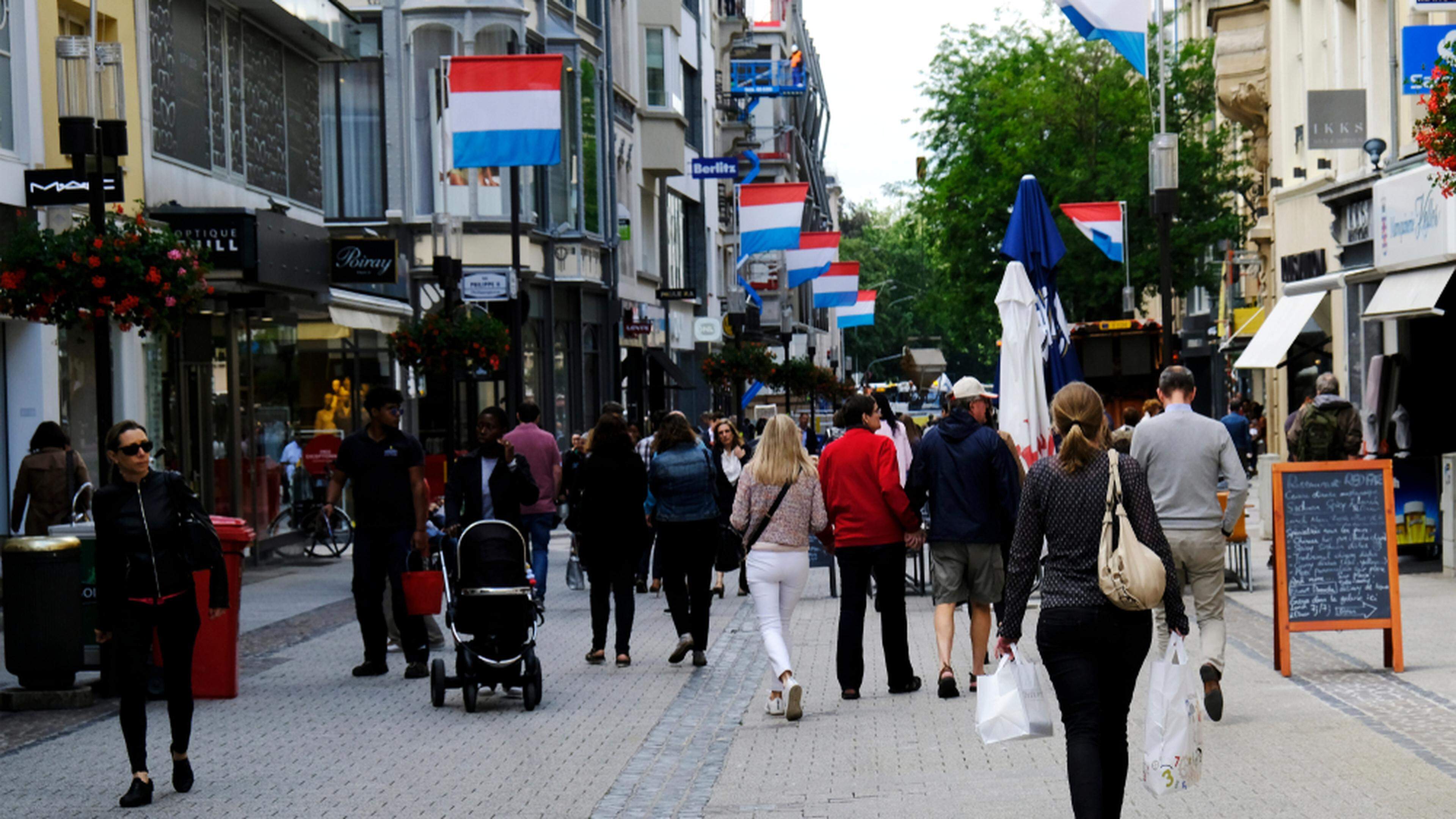 People walking in Luxembourg City, which has seen its population expand by nearly a third in the past decade