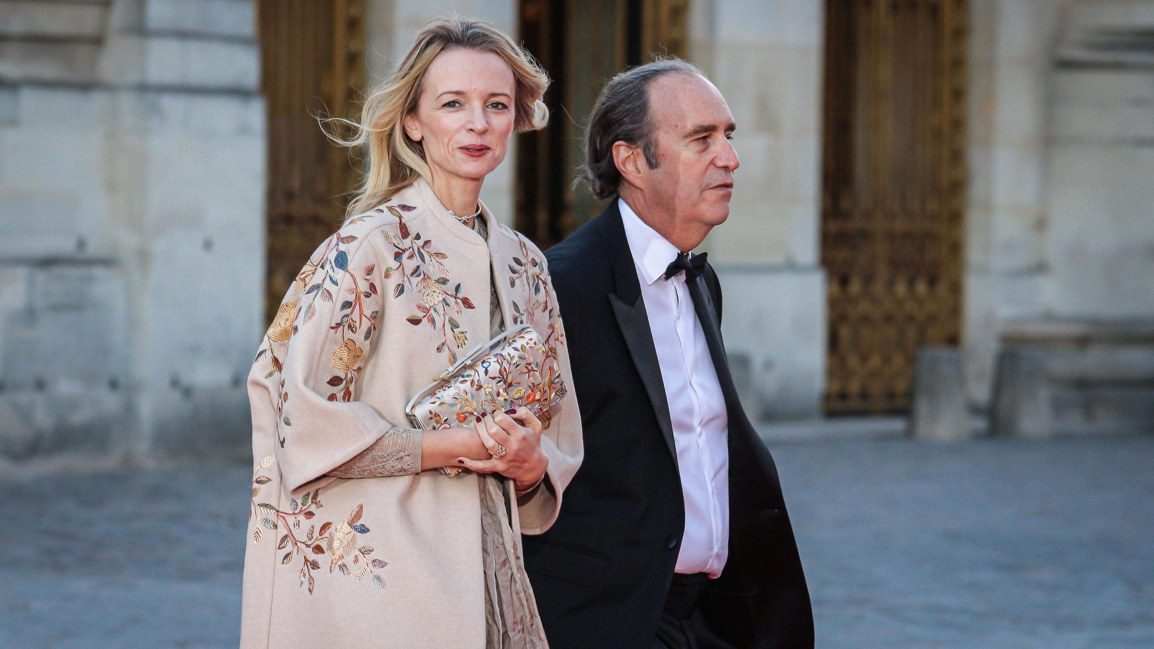 Xavier Niel and partner Delphine Arnault, director and executive vice president at Louis Vuitton, at the Palace of Versailles in September 2023