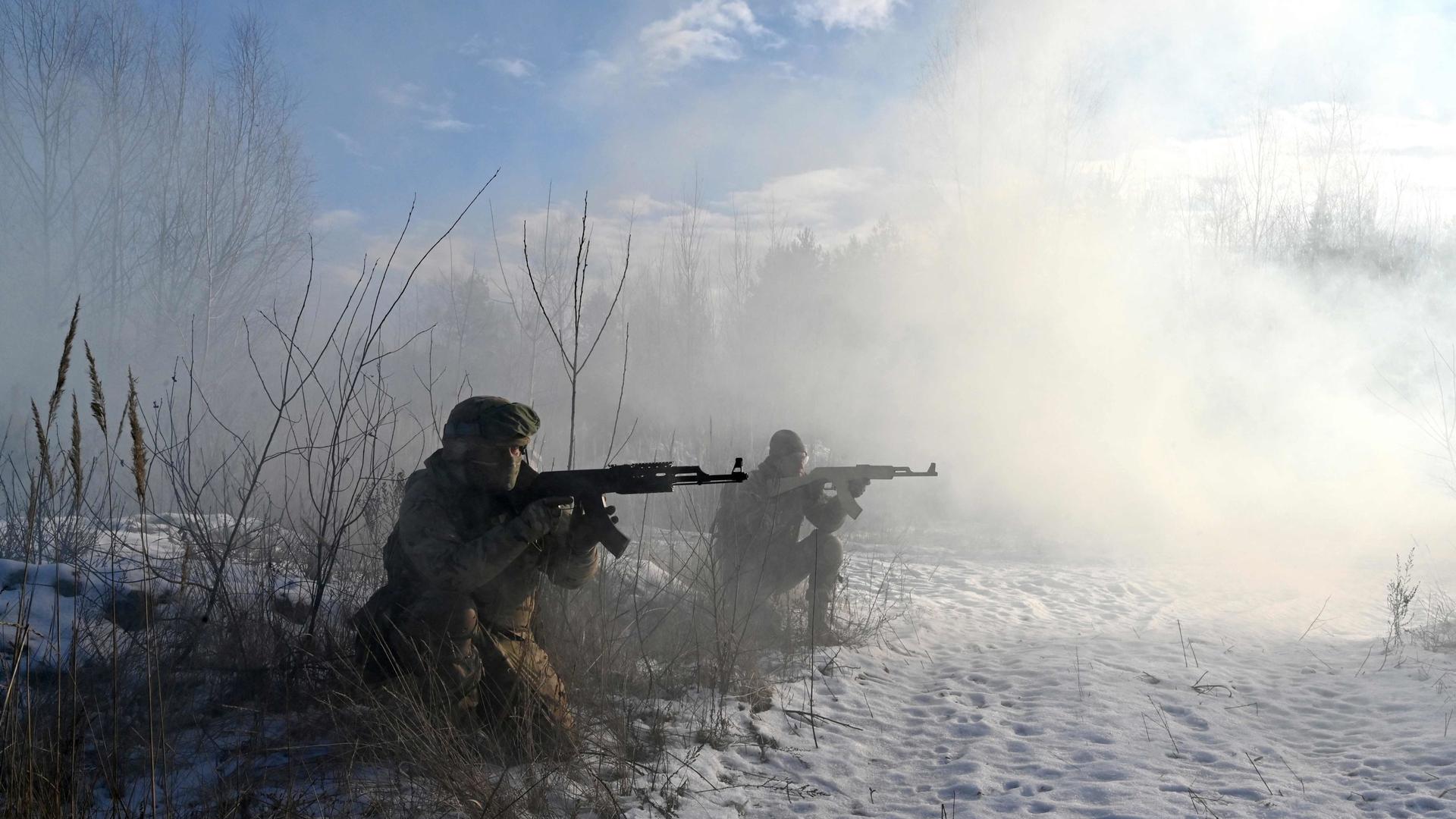 Ukrainian Territorial Defense Forces, the military reserve of the Ukrainian Armed Forces, take part in a military exercise near Kiev on 25 December.  The trainees are part of reservist battalions set-up to protect a district in Kiev in the event of an attack.