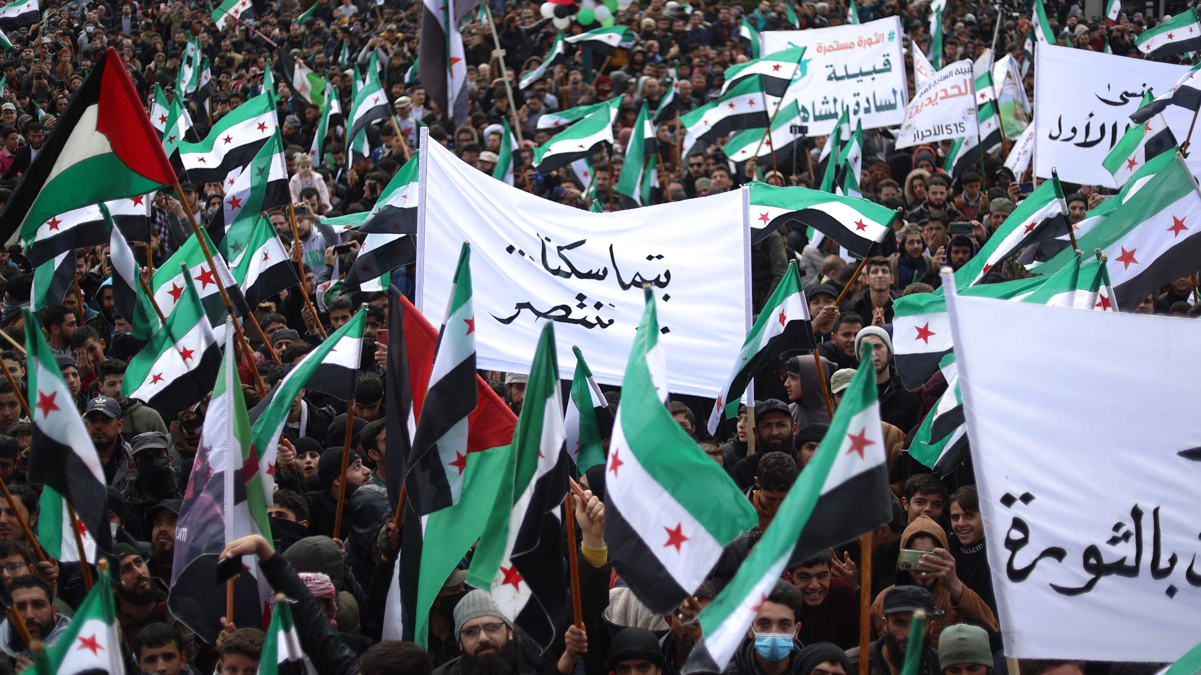 Syrians on 15 March marking 13 years since pro-democracy protests swept the country in the rebel-held city of Idlib in north-western Syria. The regime’s brutal suppression of the 2011 uprising triggered a civil war that had killed more than half a million people