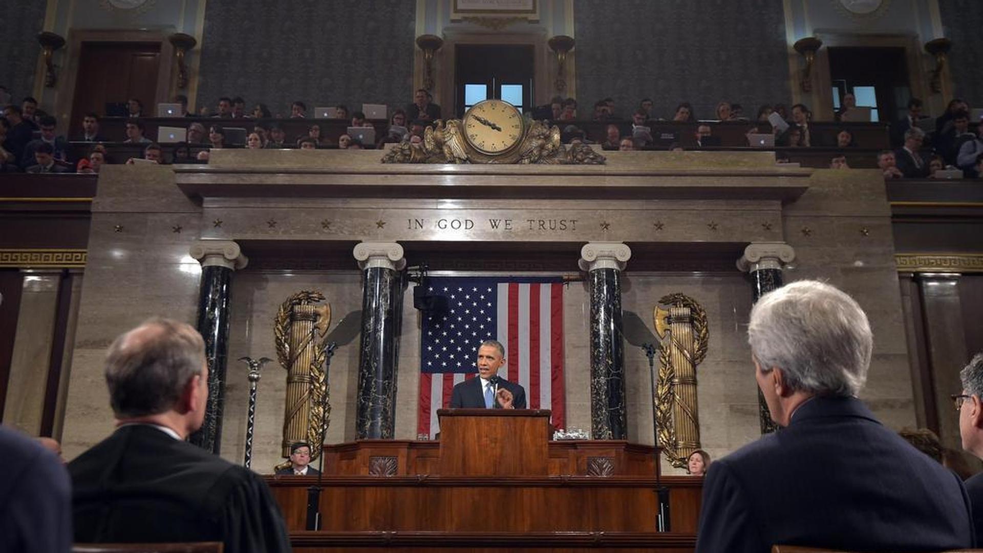 U.S. President Barack Obama (C) delivers his State of the Union address to a joint session of Congress on Capitol Hill in Washington, January 20, 2015. REUTERS/Mandel Ngan/Pool (UNITED STATES - Tags: POLITICS)