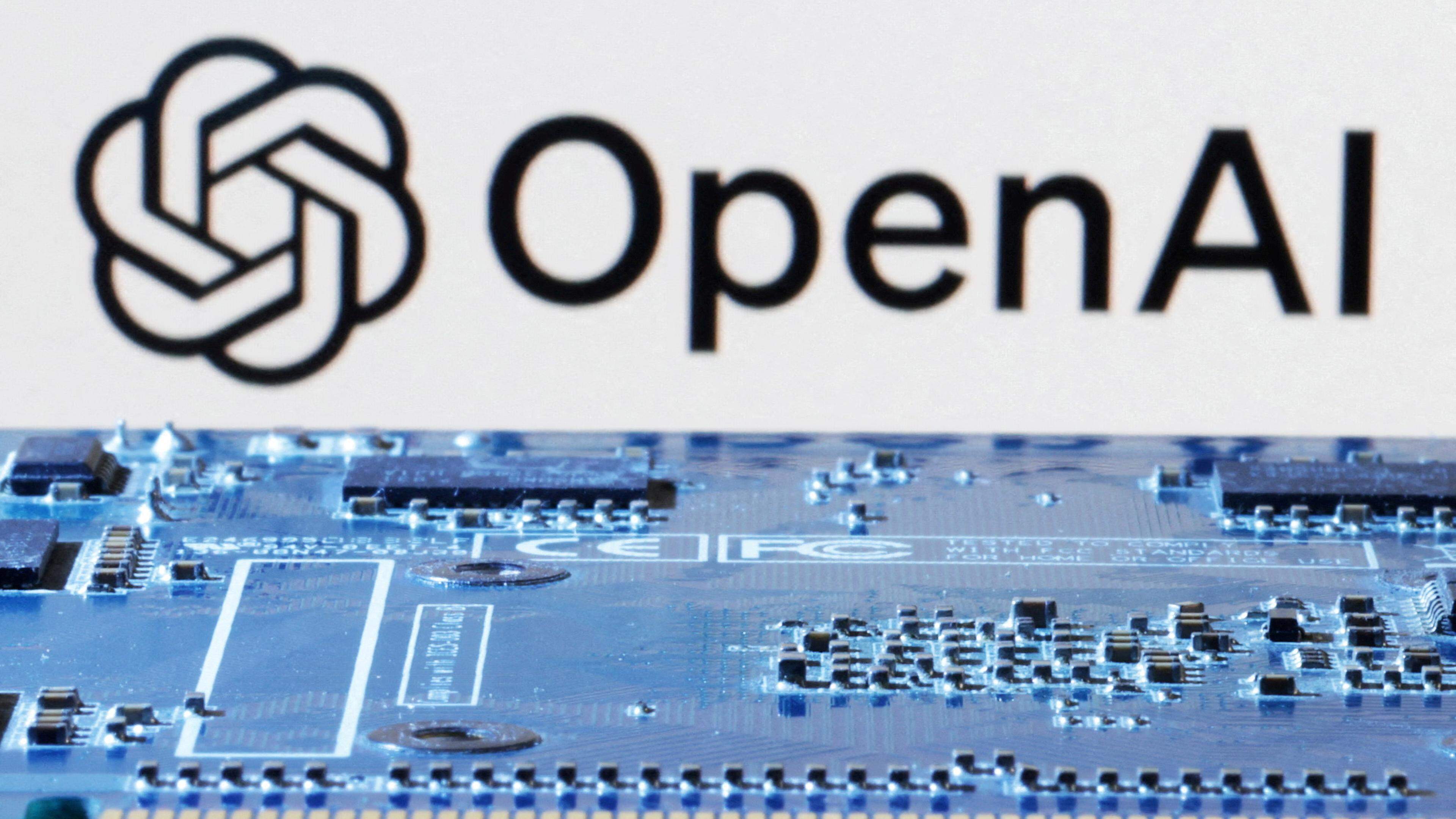 An illustration of the OpenAI logo near a computer motherboard, January 8, 2024.