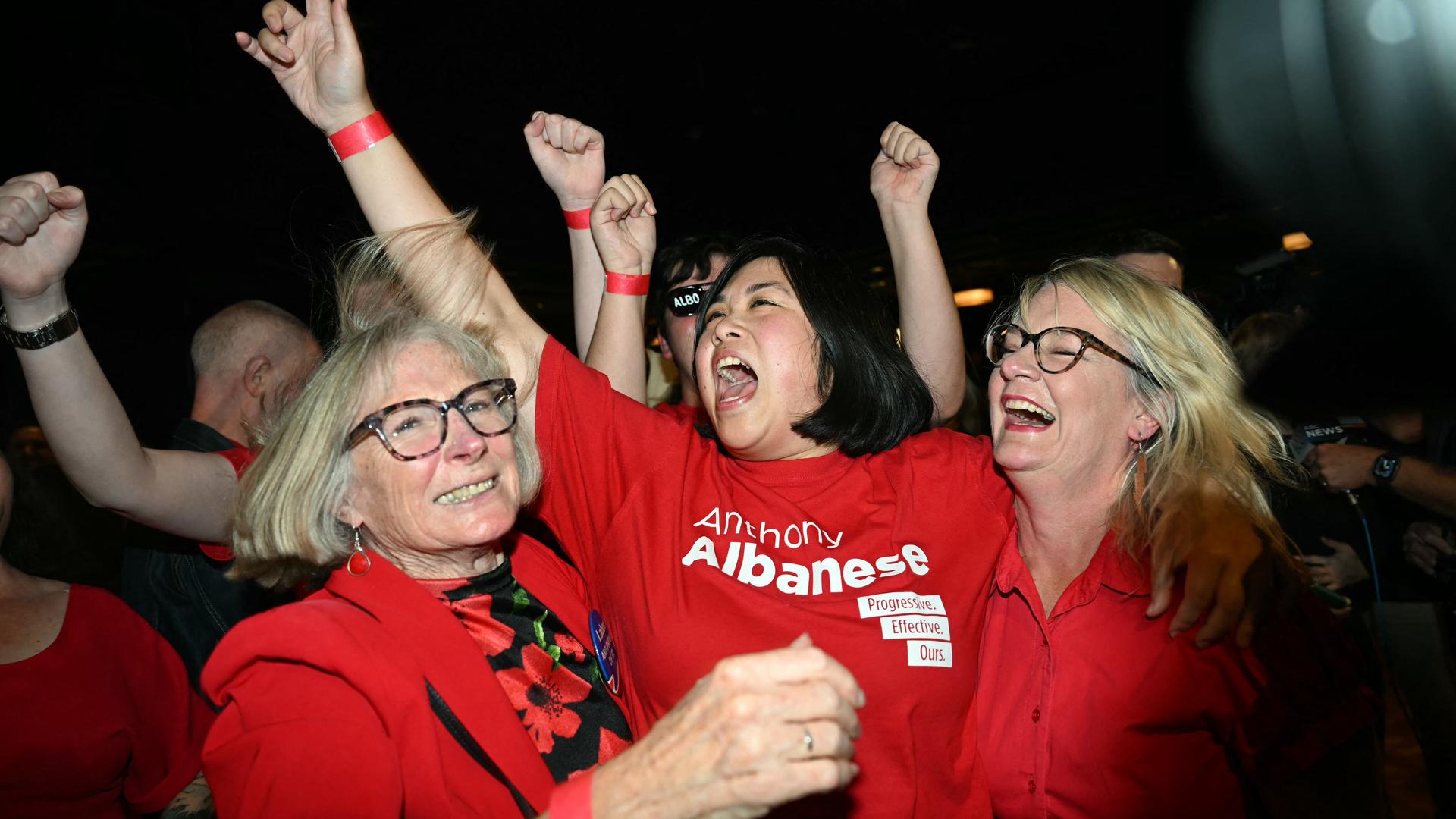 Labor Party supporters react as votes are counted in the general election at the party's election night event in Sydney on 3 May.