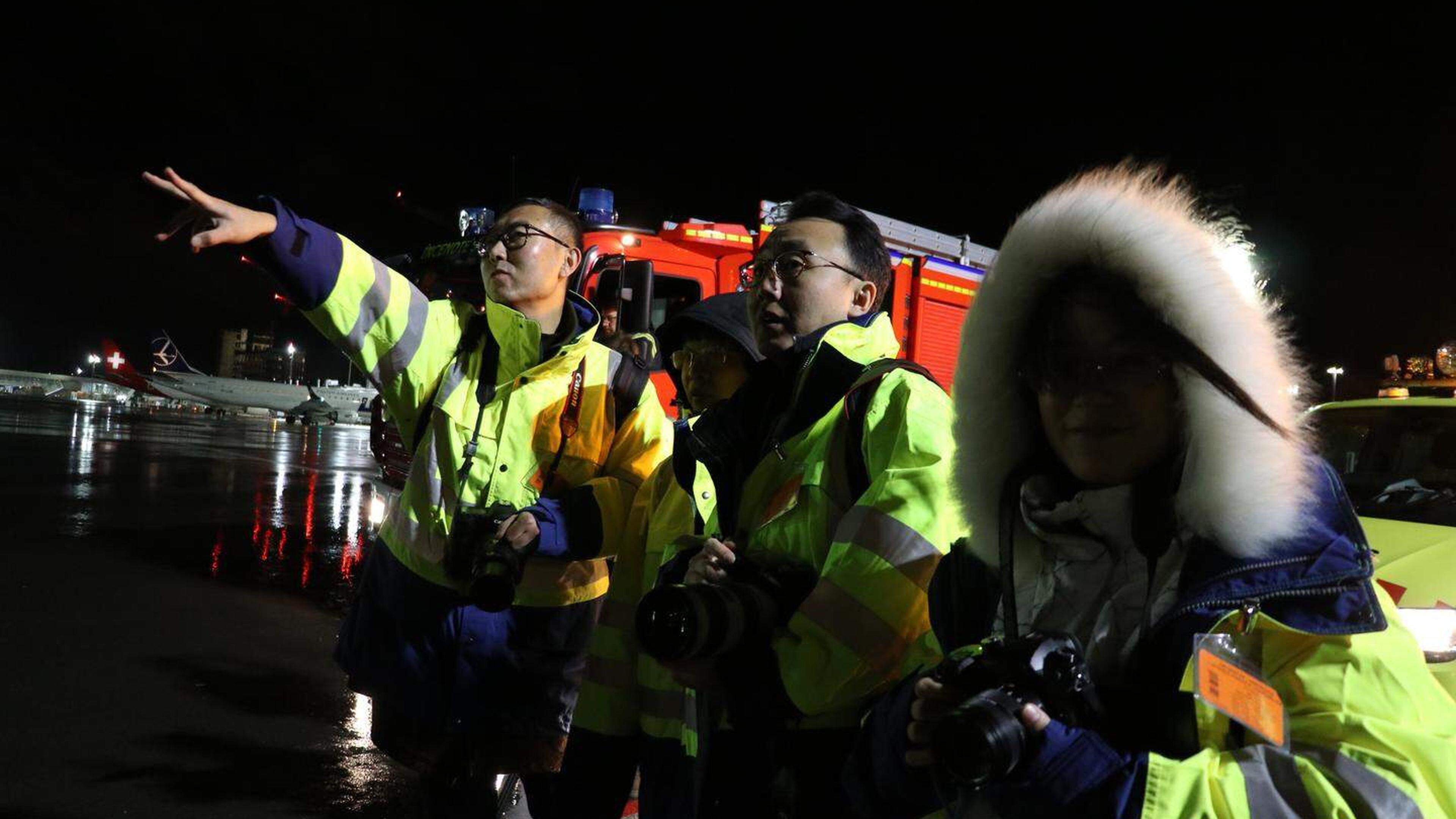 China Central Television crew record the arrival of the first China Southern direct flight to Luxembourg on 21 December 2023 