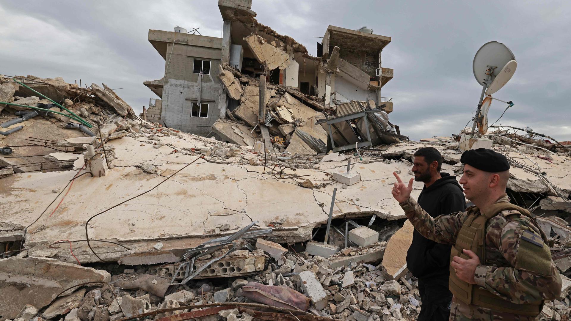 Lebansese soldiers patrol along a residential area that was devastated by the war between Israel and Hezbollah, in the southern coastal town of Naqura, on the border with Israel on January 22, 2025. (Photo by Anwar AMRO / AFP)