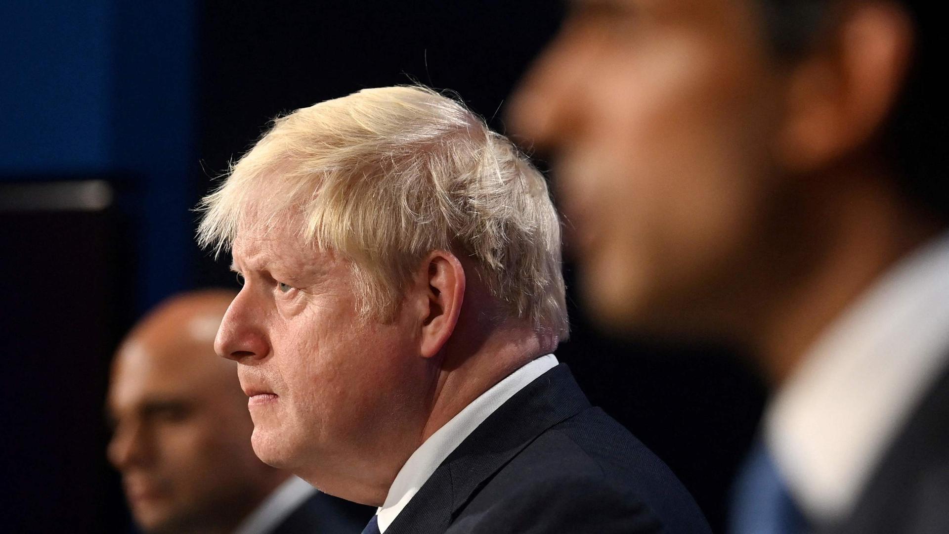 Boris Johnson, Rishi Sunak (right) and Sajid Javid (left)