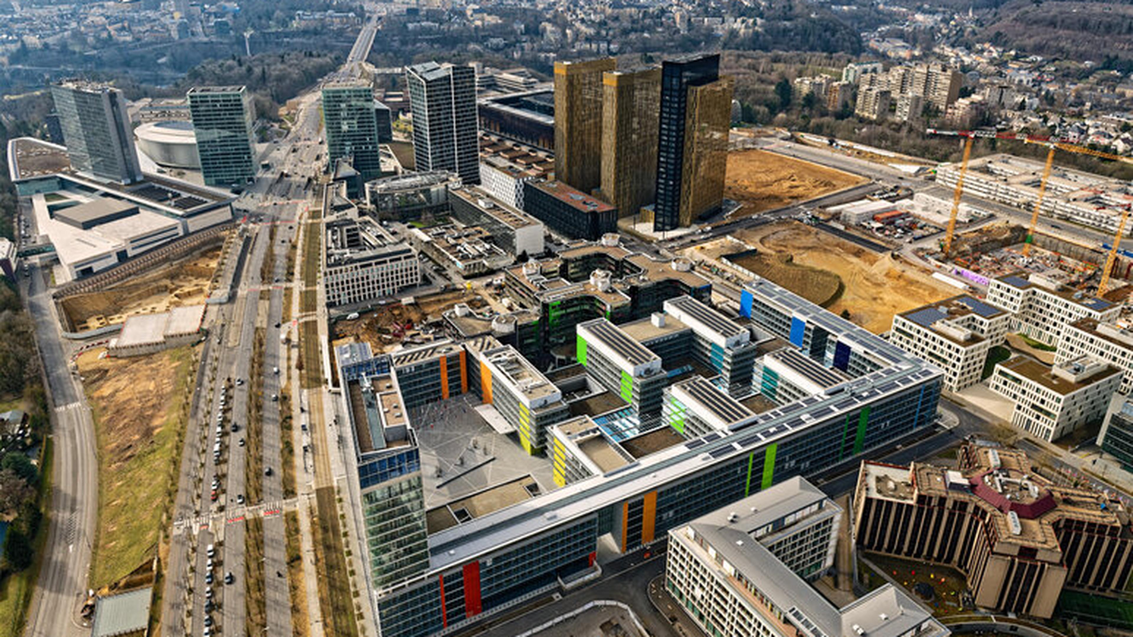 An aerial view of the European Parliament building in Kirchberg, surrounded by other EU institutions and agencies