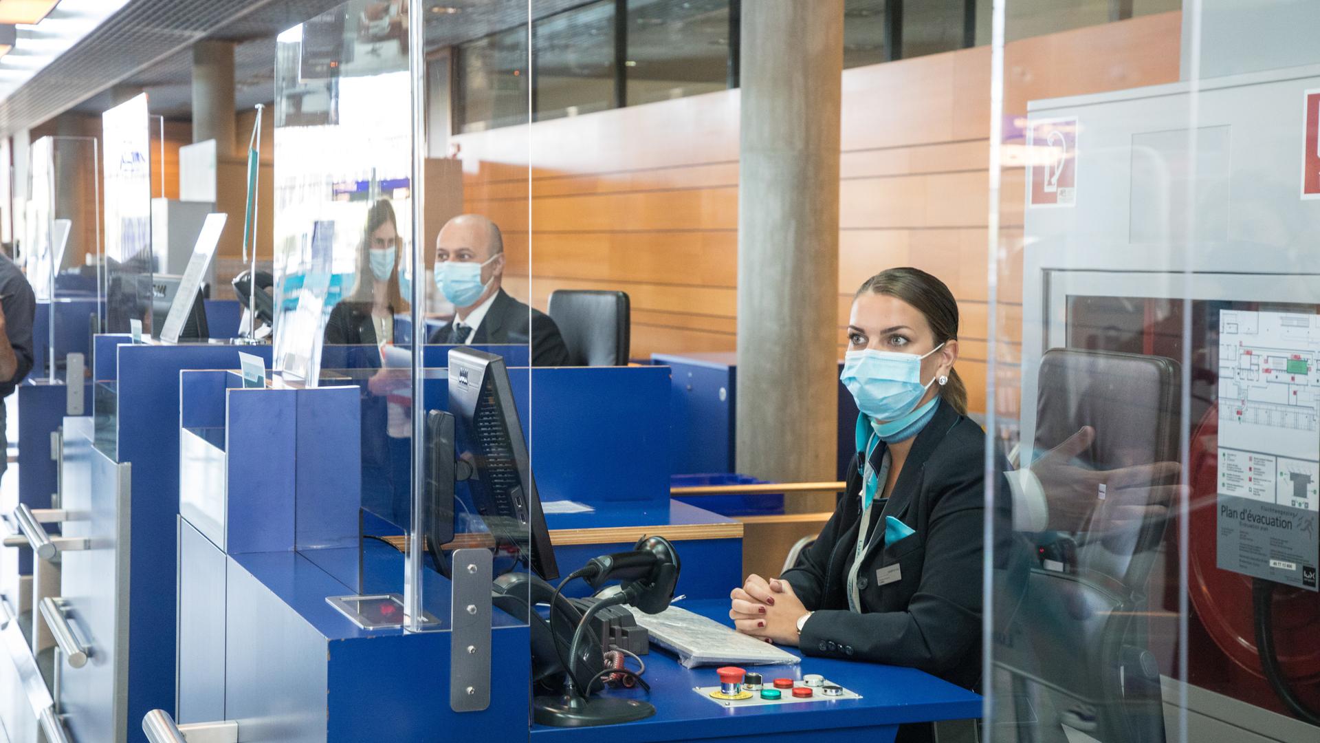 Luxair staff at Luxembourg airport during the 2020 Covid-19 pandemic