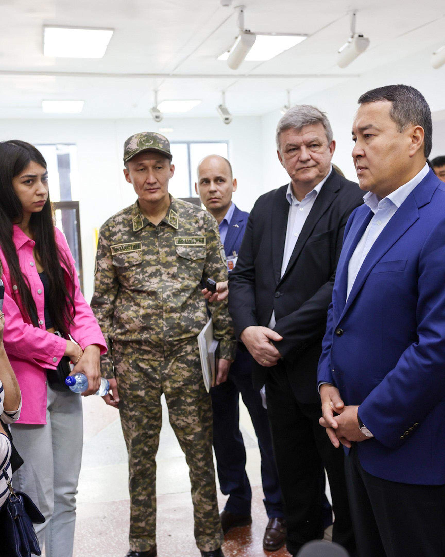 Kazakhstan’s then-Prime Minister Alikhan Smailov met with family members of miners killed in an August 2023 accident at a mine operated by ArcelorMittal. 
