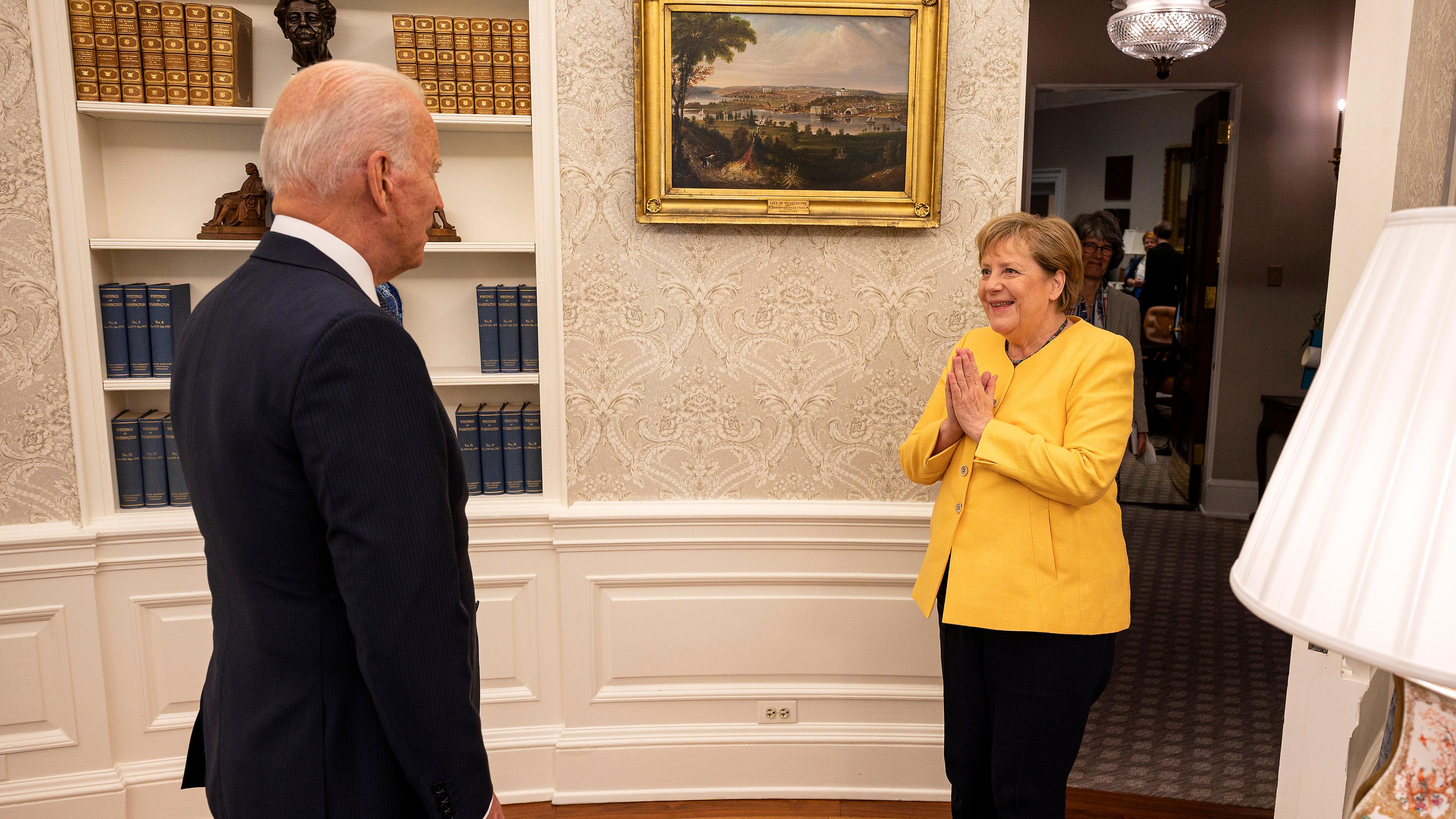 US President Joe Biden welcomes German Chancellor Angela Merkel to the Oval Office of the White House on Thursday. 