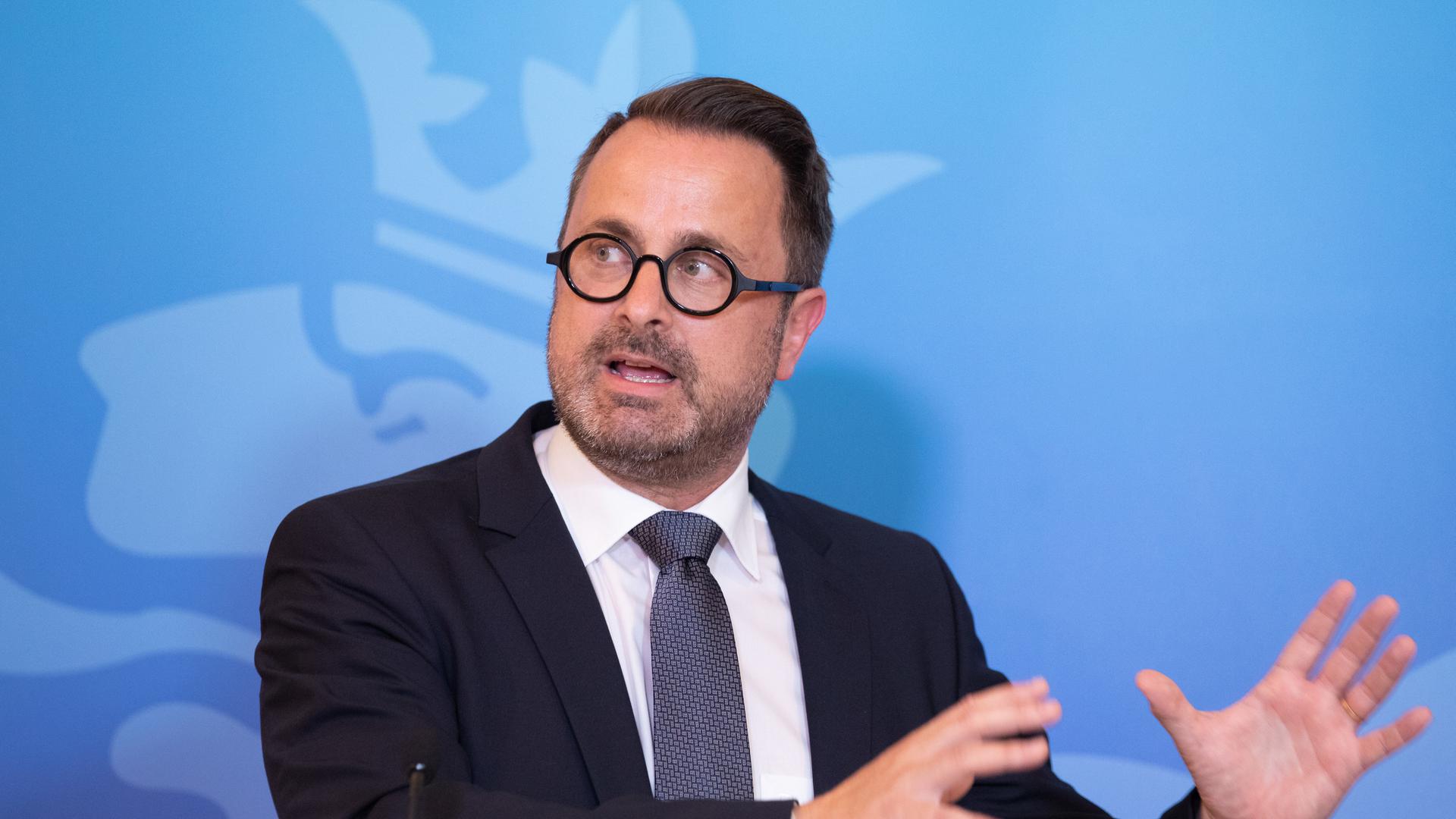 Prime Minister Xavier Bettel speaks at a press conference on Wednesday describing government plans to further ease disease-fighting restrictions.