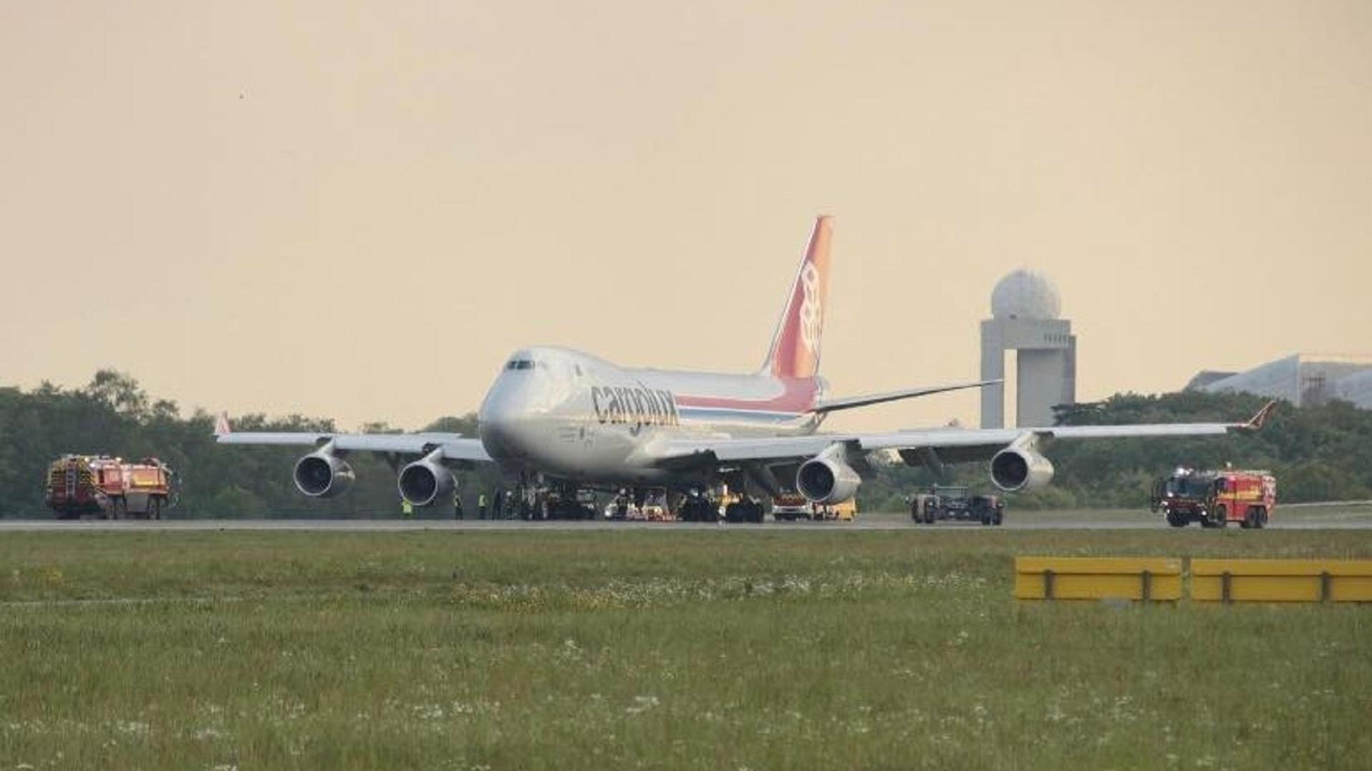 Emergency crews respond after a Cargolux jet was damaged during a hard landing on 14 May