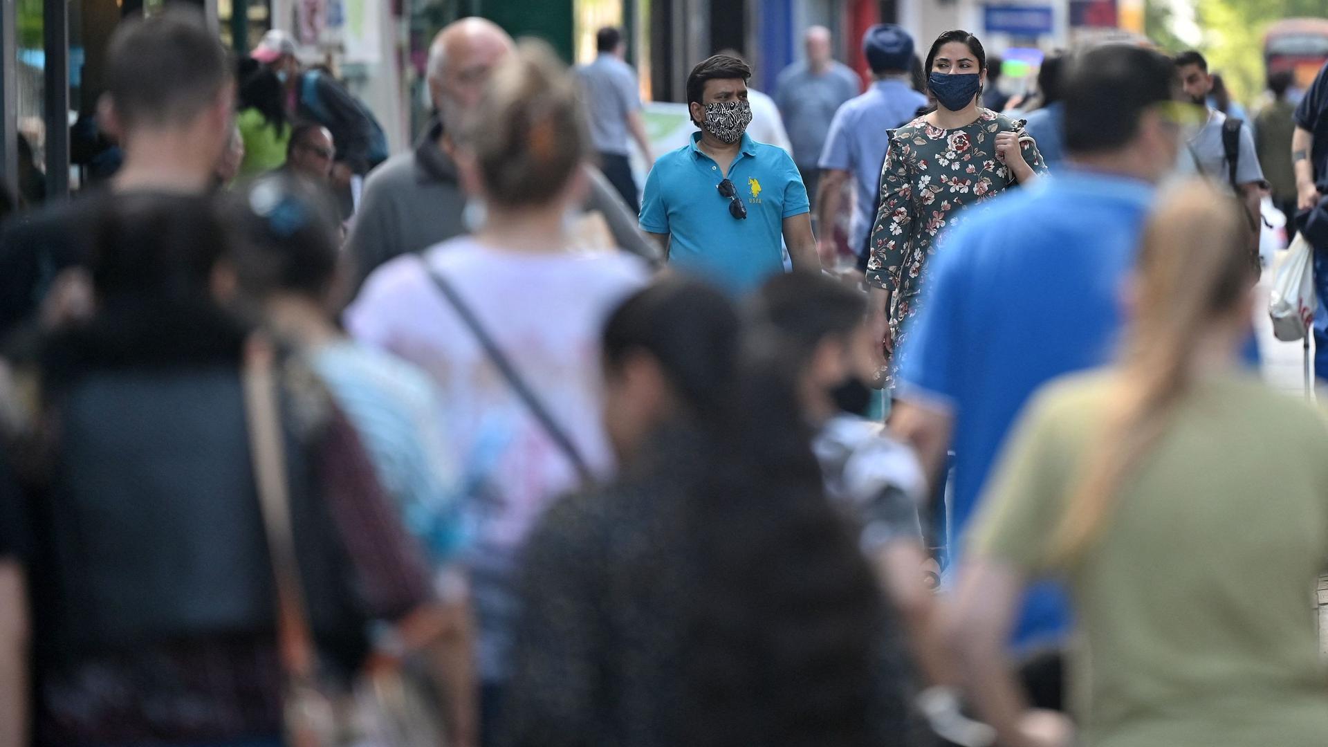 Pedestrians in Hounslow, west London on June 1, 2021. 