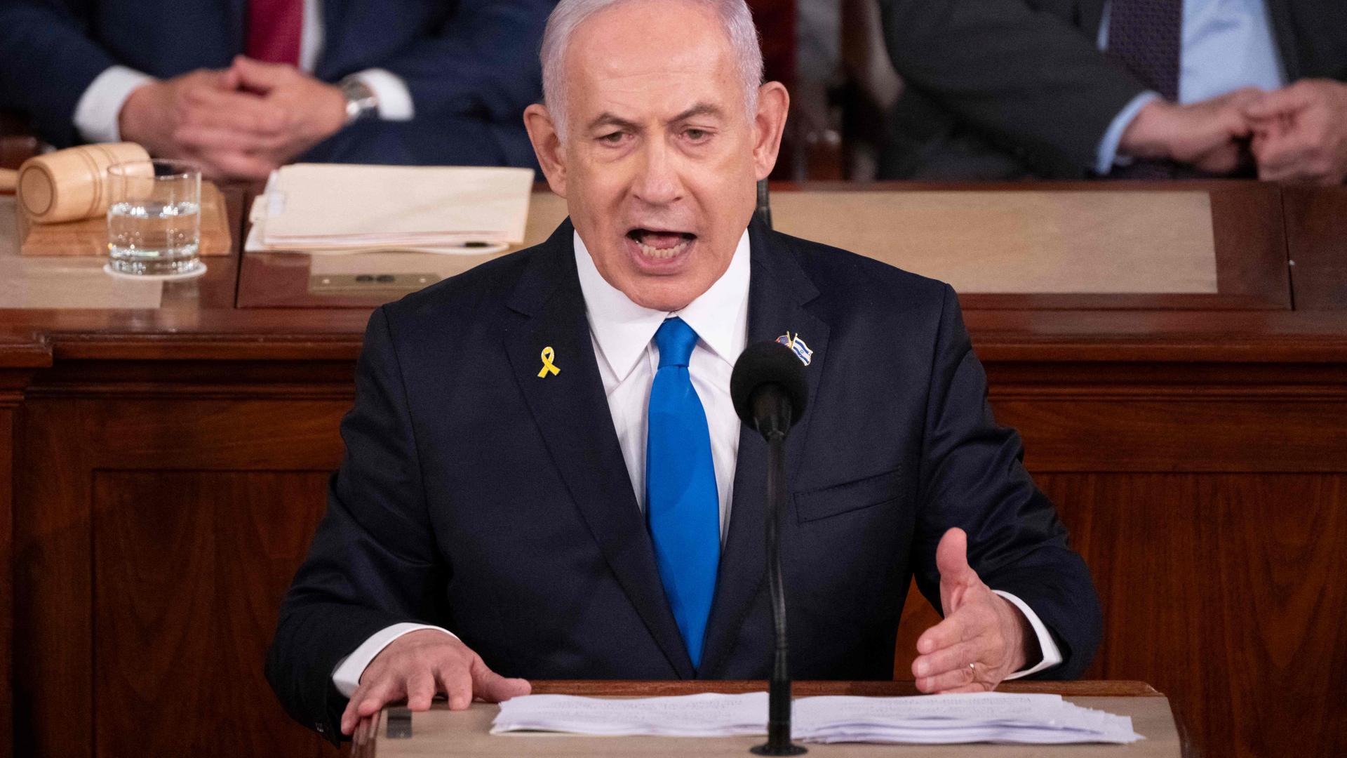 TOPSHOT - Israeli Prime Minister Benjamin Netanyahu speaks to a joint meeting of Congress at the US Capitol on July 24, 2024, in Washington, DC. (Photo by ROBERTO SCHMIDT / AFP)
